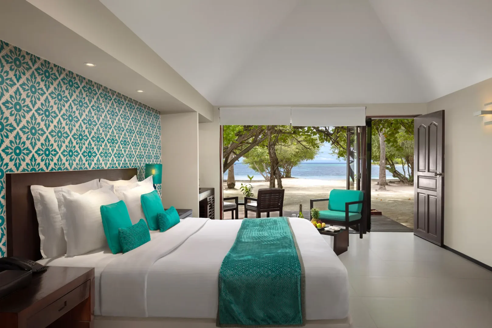 beach villa relaxation interior space at adaaran select hudhuranfushi maldives