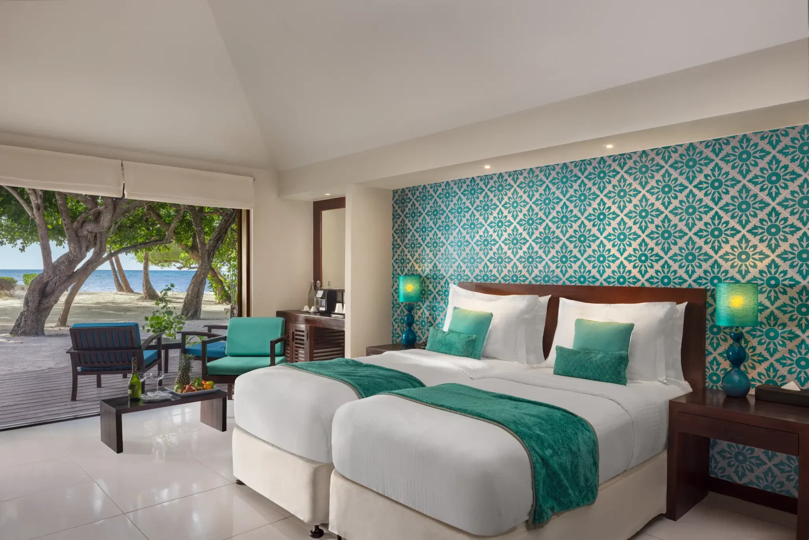 family beach villa twin bed interior space at adaaran select hudhuranfushi maldives