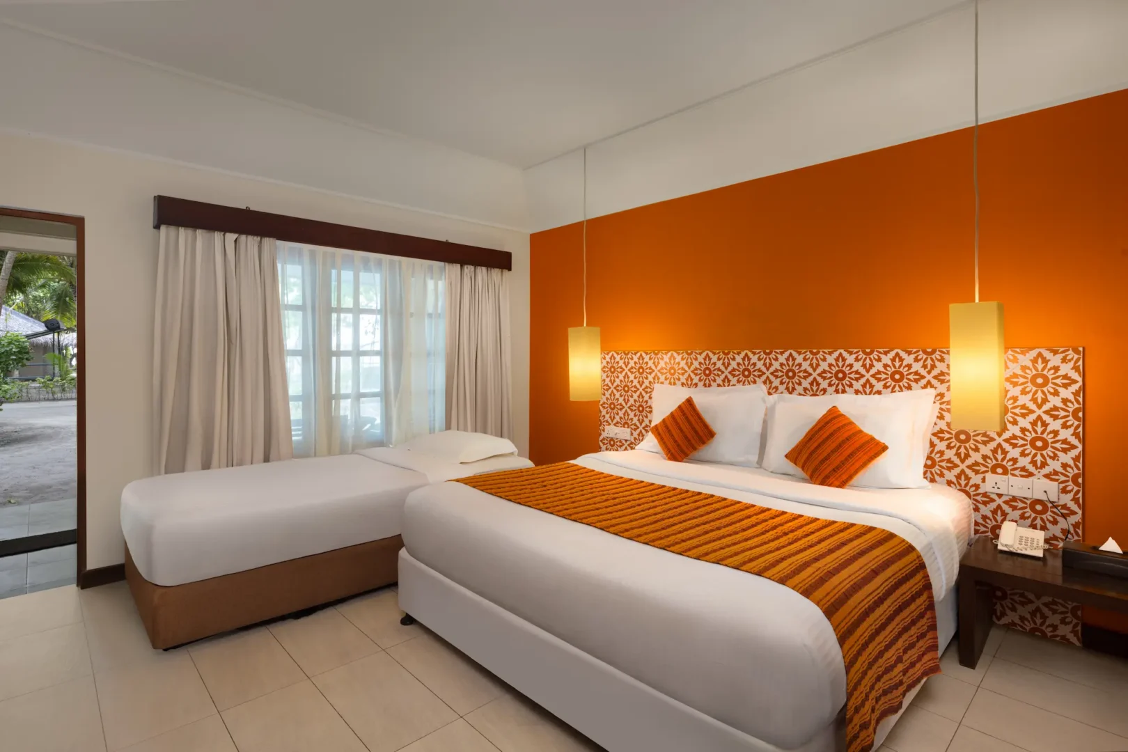 garden villa extra bed setup at adaaran select hudhuranfushi maldives