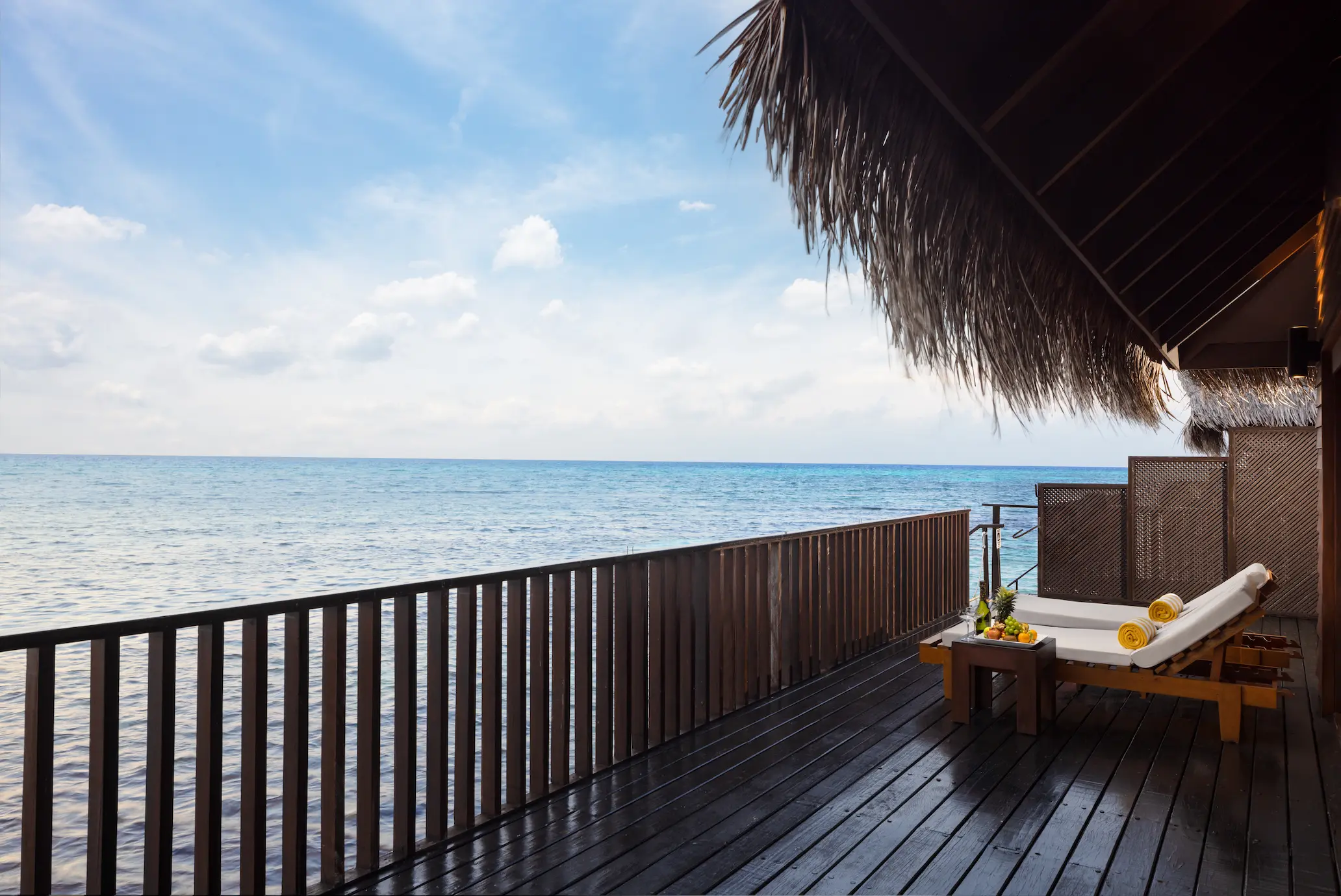 sunset ocean villa terrace view at adaaran select hudhuranfushi maldives