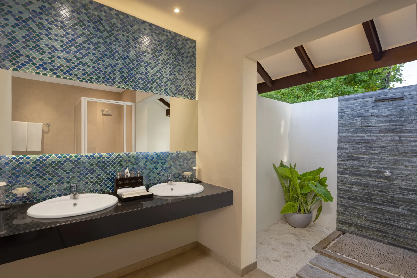 adaaran select meedhupparu raa atoll maldives deluxe family beach villa bathroom interior