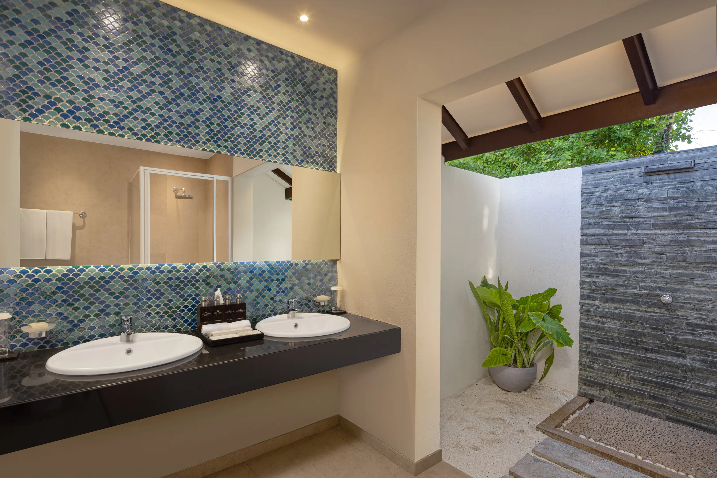 adaaran select meedhupparu raa atoll maldives deluxe family beach villa bathroom interior