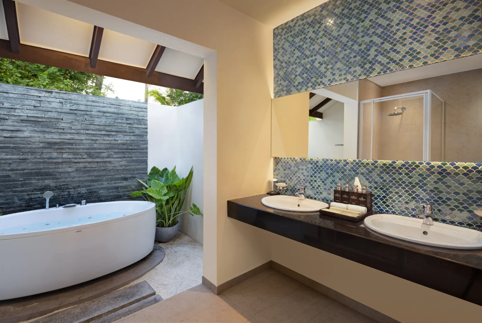 adaaran select meedhupparu raa atoll maldives deluxe family beach villa bathroom suite