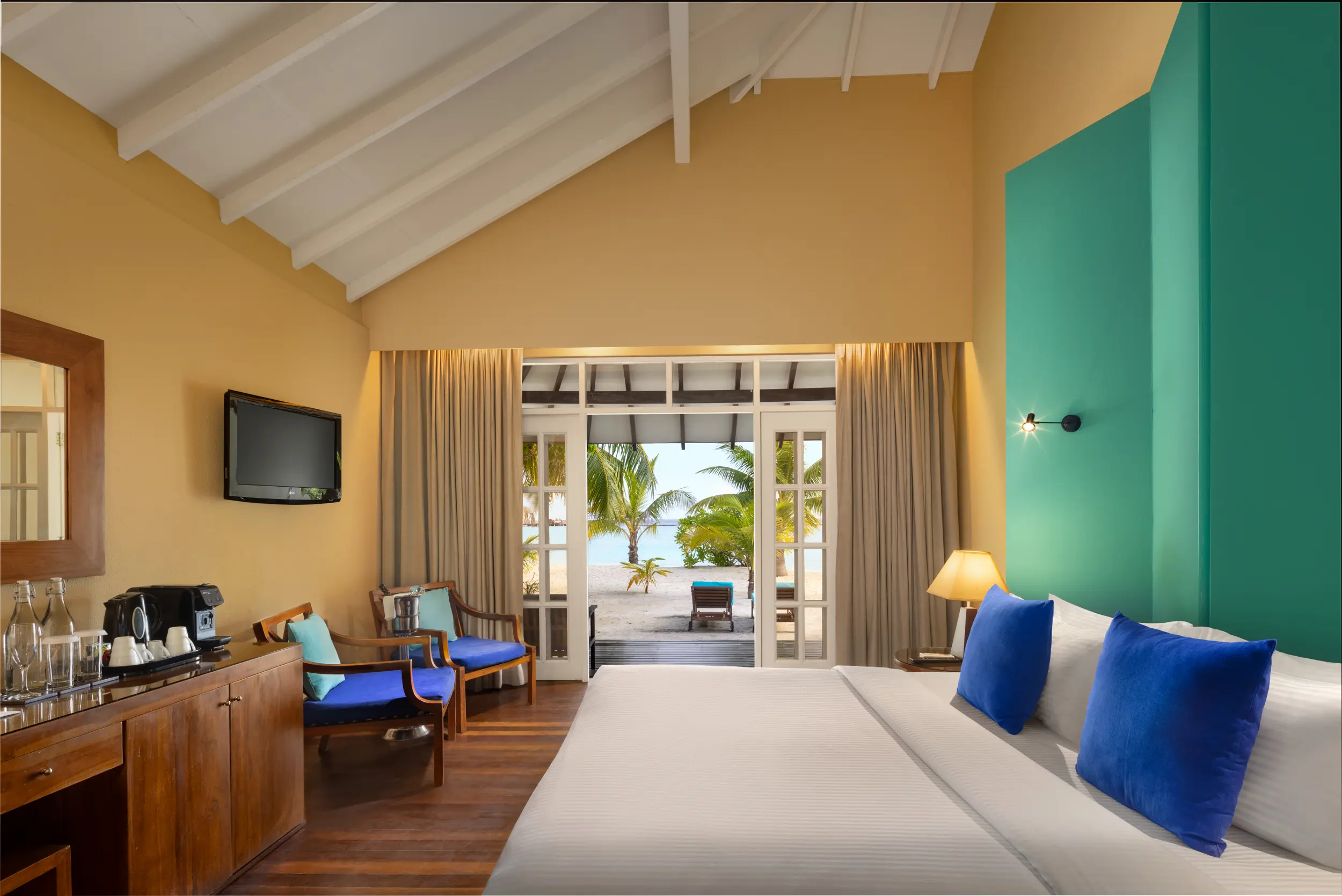 adaaran select meedhupparu raa atoll maldives family beach villa master bedroom