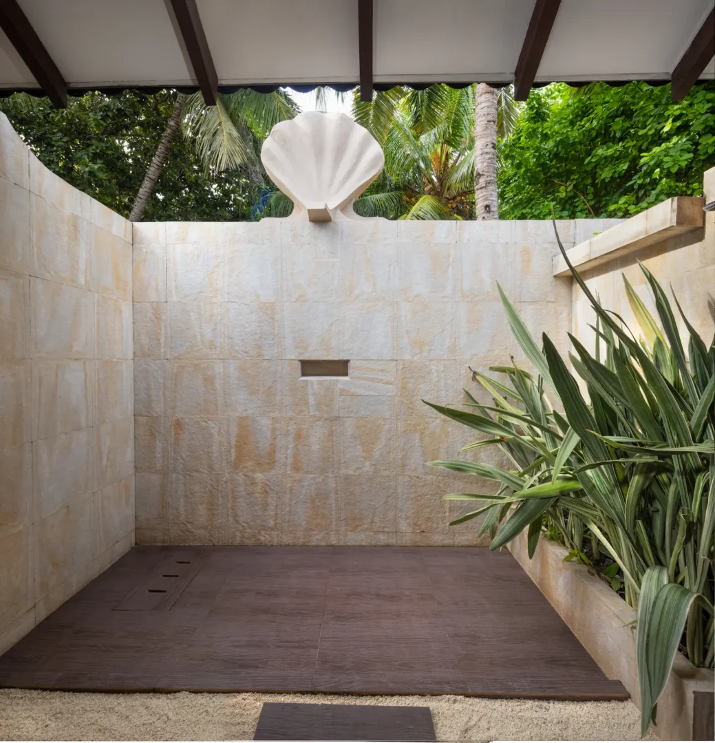 adaaran select meedhupparu raa atoll maldives family beach villa shower area