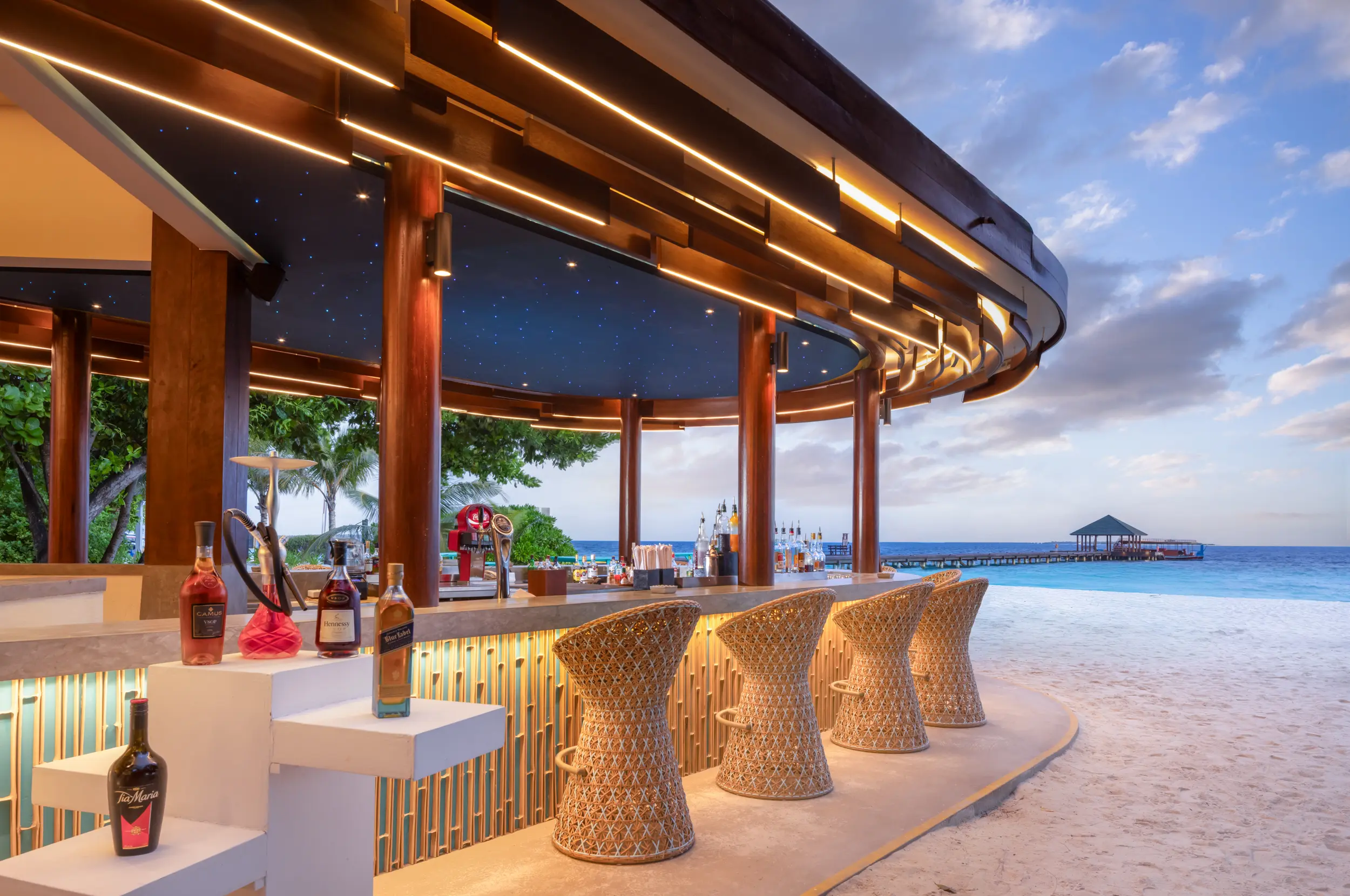 adaaran select meedhupparu raa atoll maldives sunset bar beachfront lounge