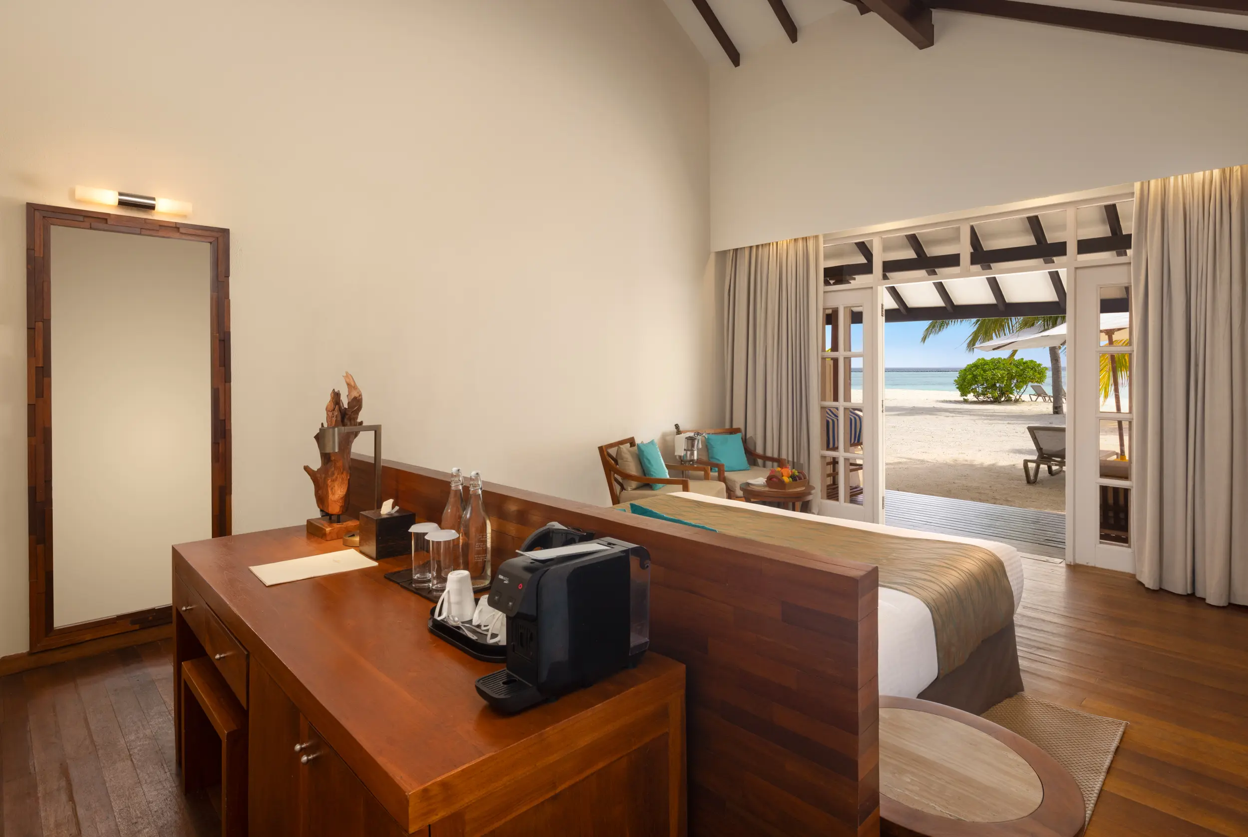 adaaran select meedhupparu raa atoll maldives sunset beach villa bed