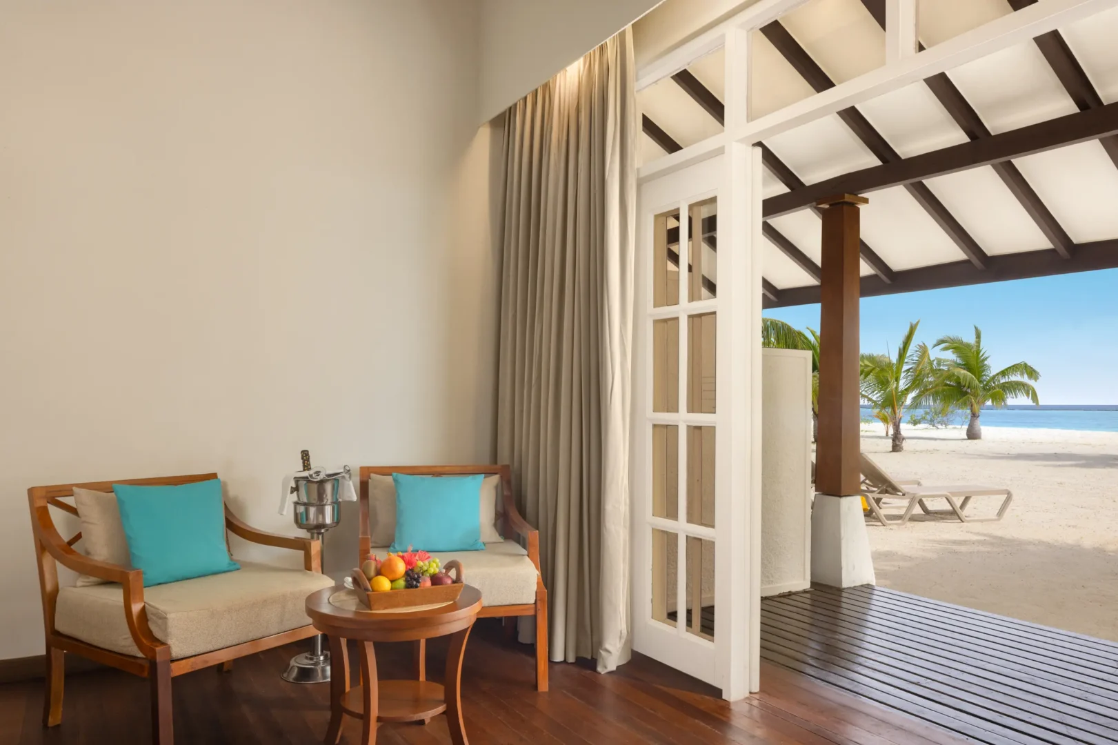 adaaran select meedhupparu raa atoll maldives sunset beach villa exterior pathway