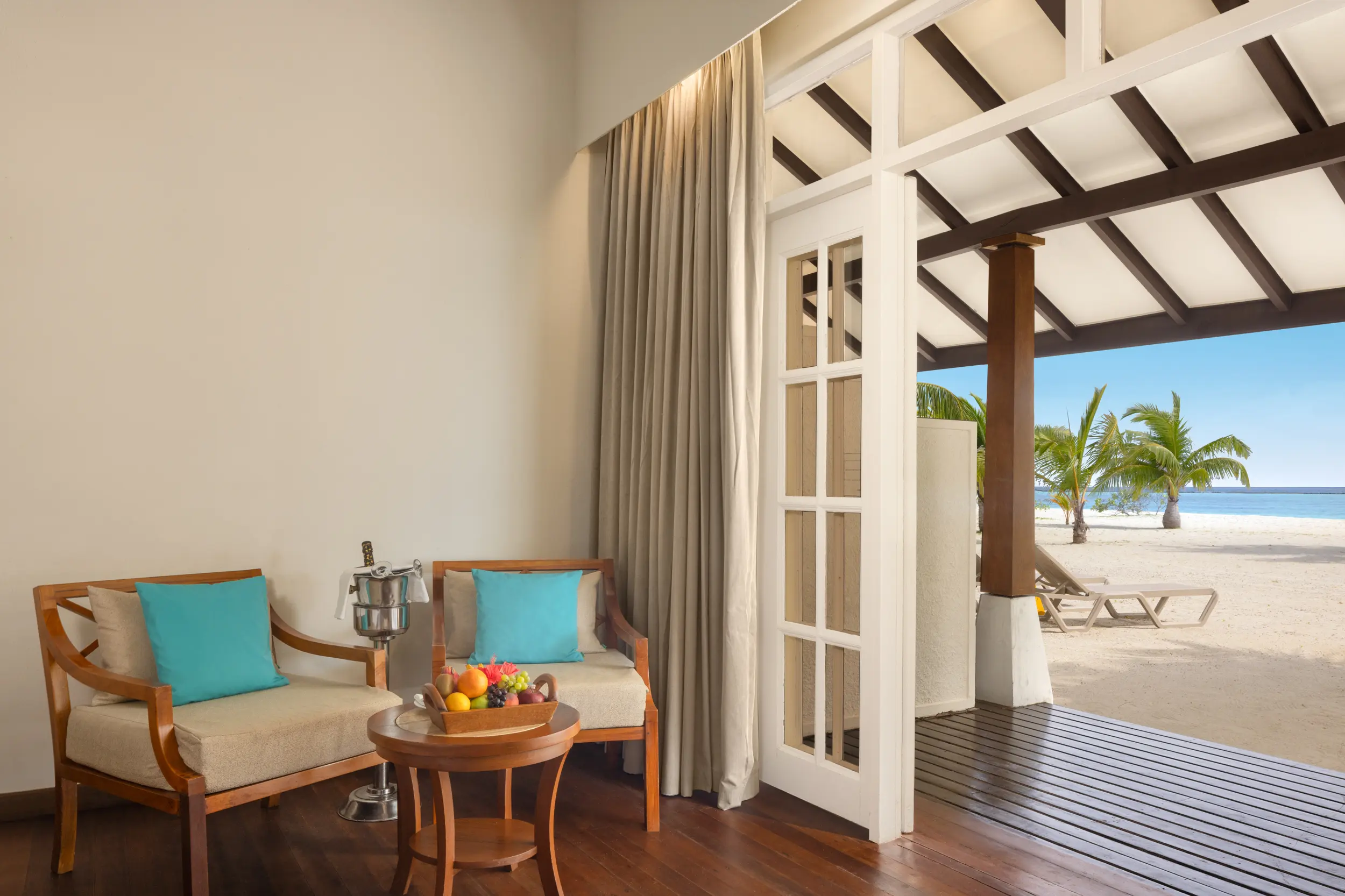 adaaran select meedhupparu raa atoll maldives sunset beach villa exterior pathway