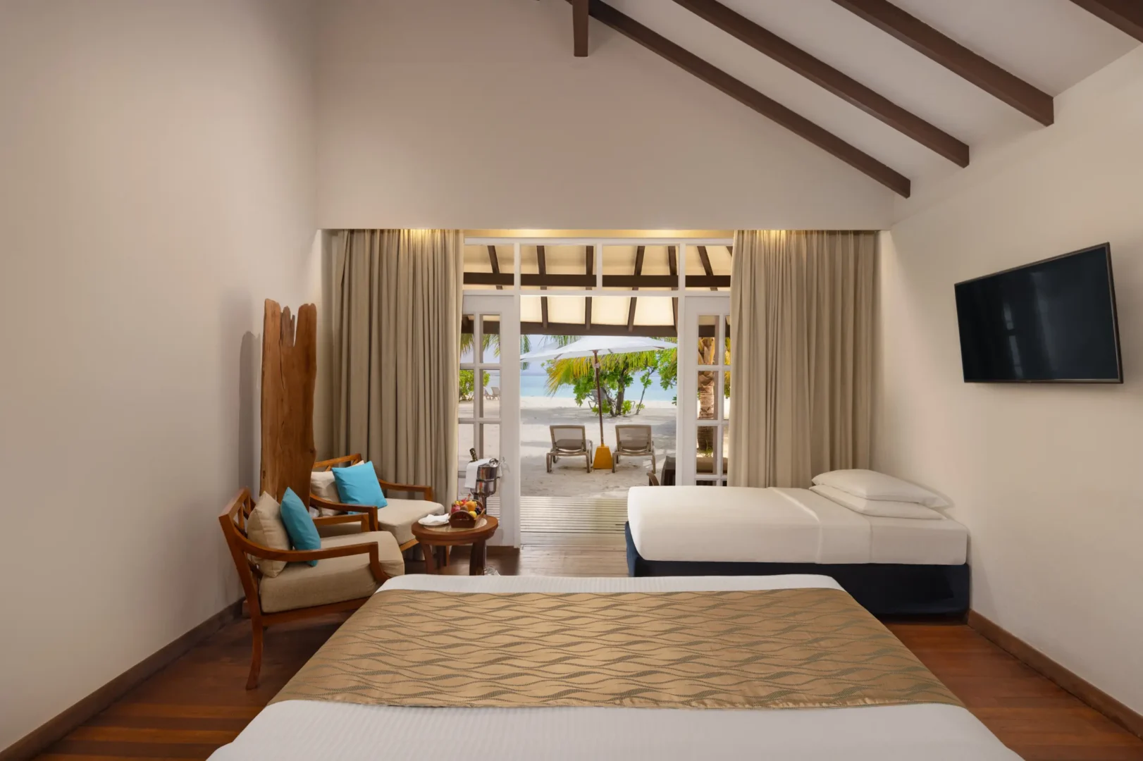 adaaran select meedhupparu raa atoll maldives sunset beach villa view