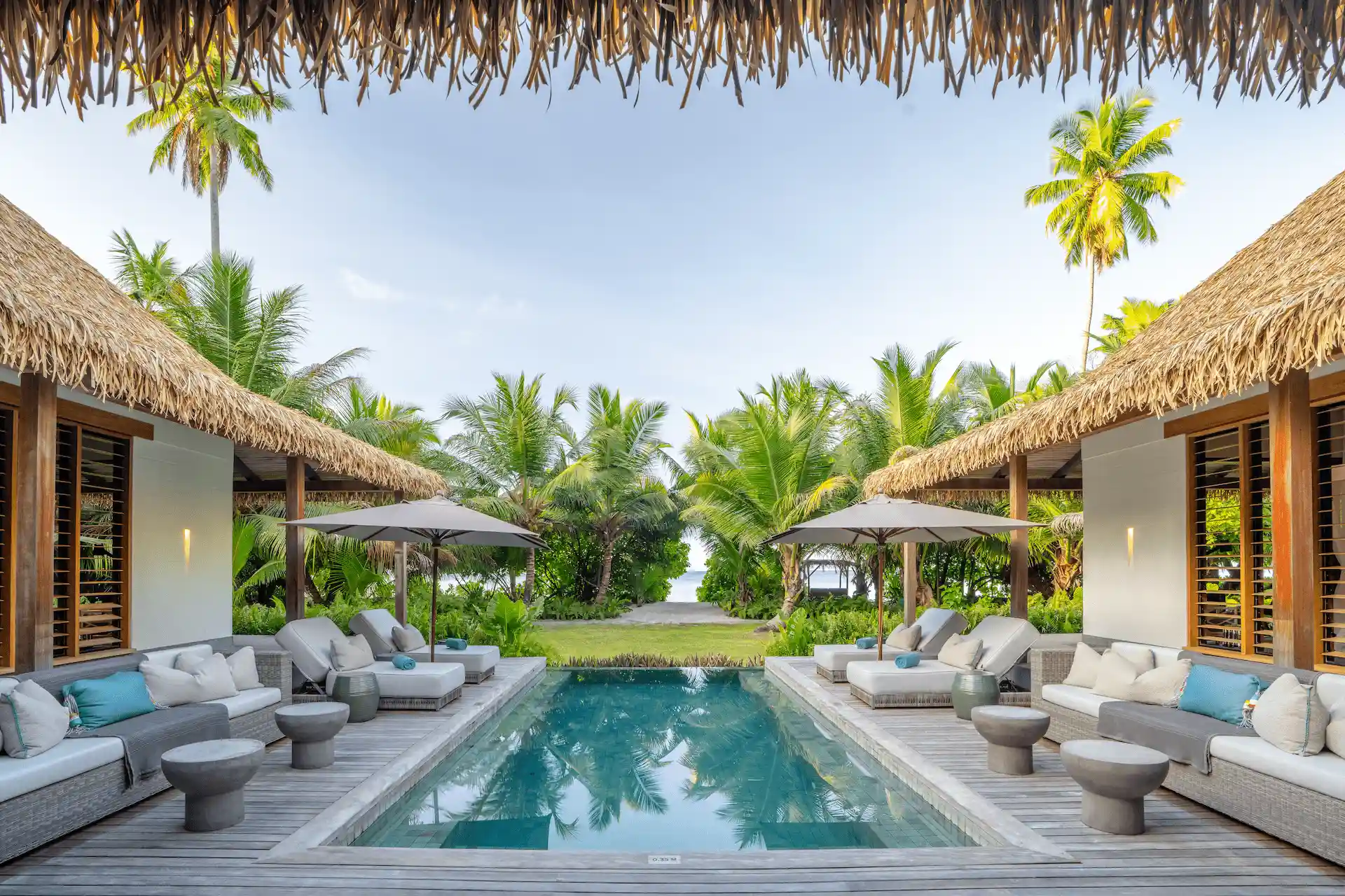 alphonse island seychelles the beach retreat with private pool, sun loungers, and panoramic ocean and tropical garden views