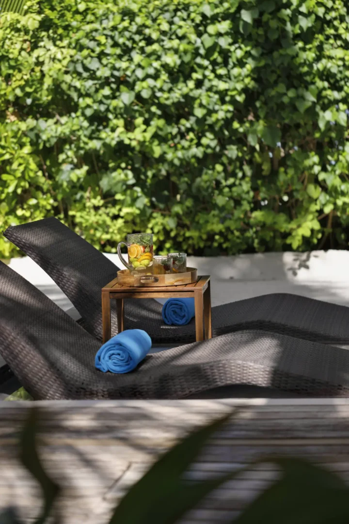 anantara dhigu maldives resort sunset beach pool villa sunbed