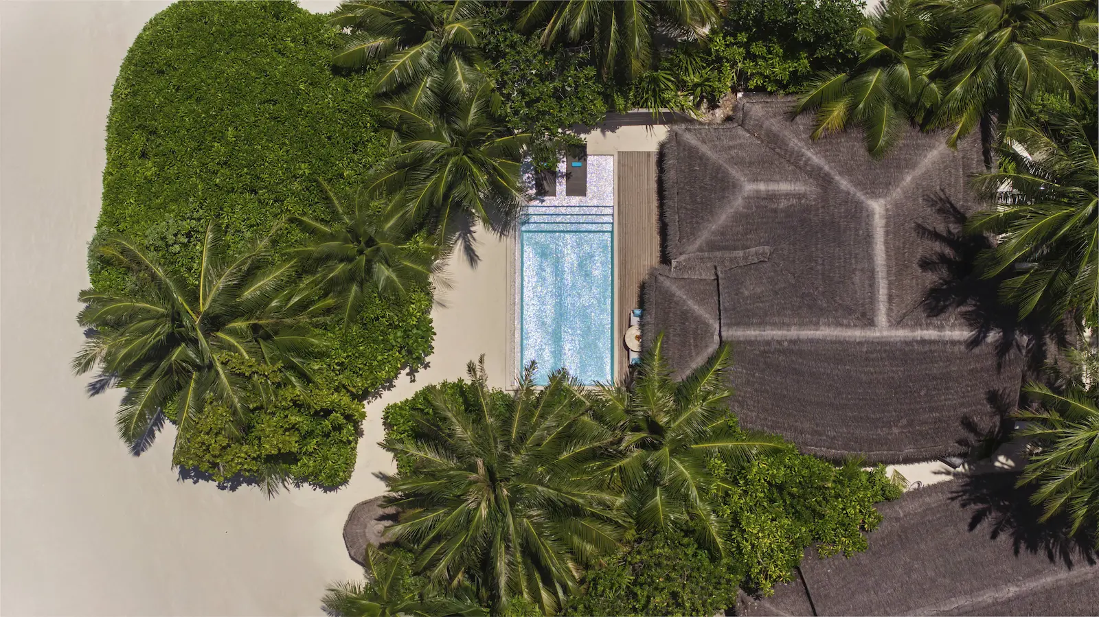 anantara dhigu maldives resort two bedroom family beach pool villa aerial