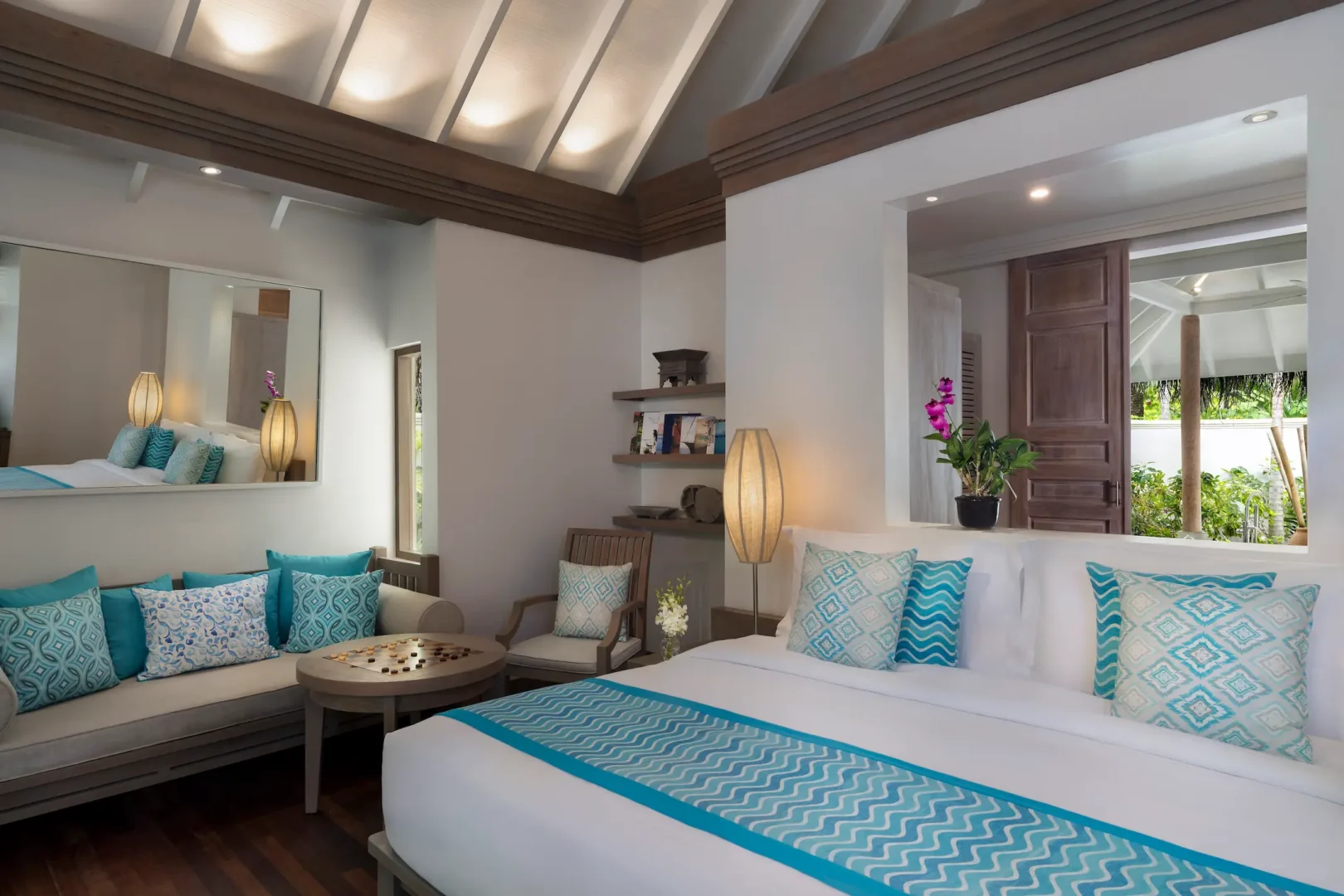 anantara dhigu sunset beach villa bedroom angle