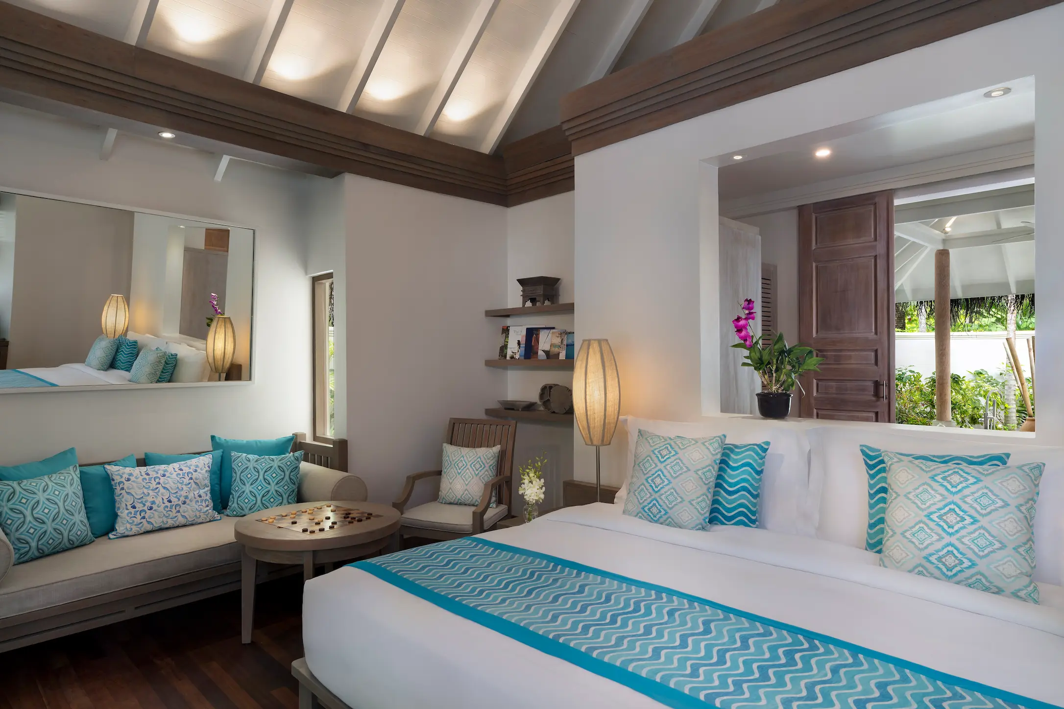 anantara dhigu sunset beach villa bedroom angle
