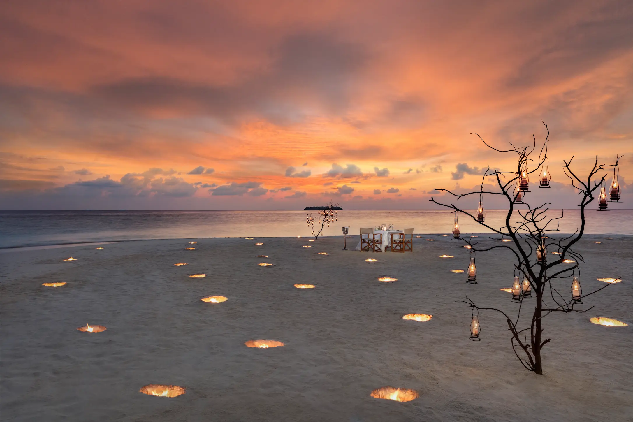 relaxed poolside lifestyle at manzaru in anantara kihavah maldives villas overlooking shimmering turquoise water