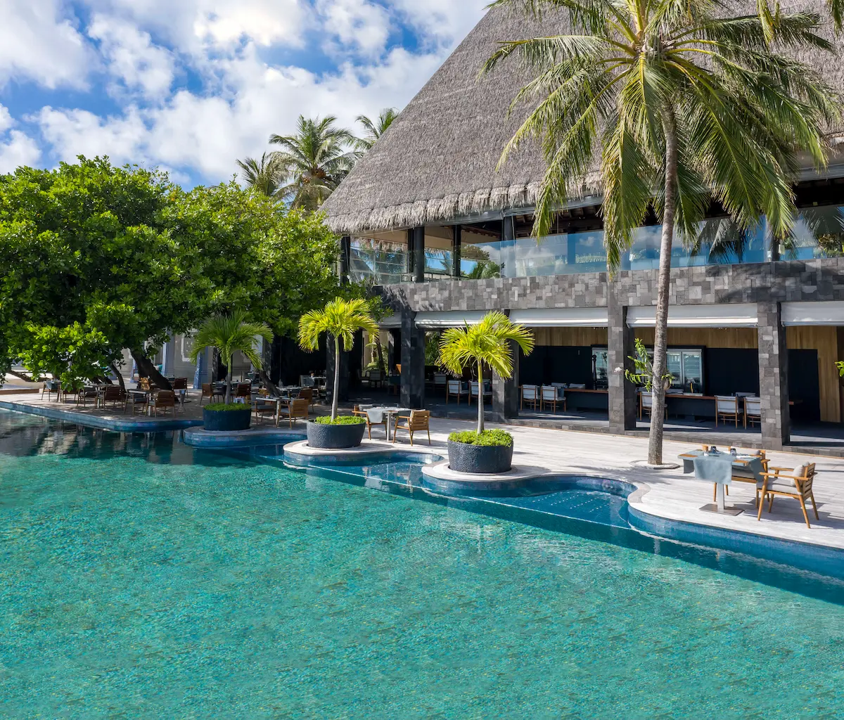 aerial view of manzaru restaurant at anantara kihavah maldives villas overlooking pristine turquoise waters