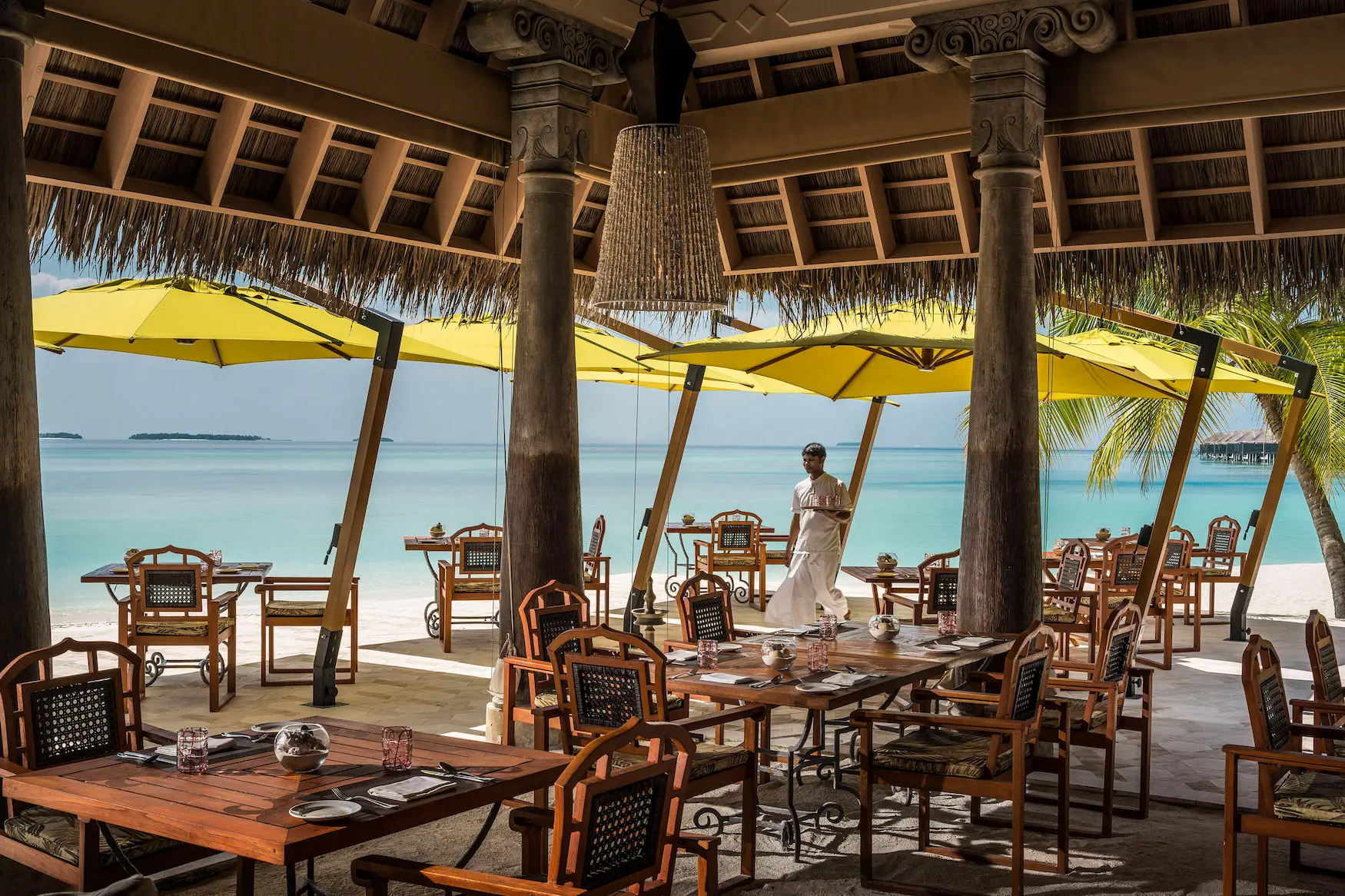 elegant plated dishes at anantara kihavah maldives villas showcasing refined island dining presentation