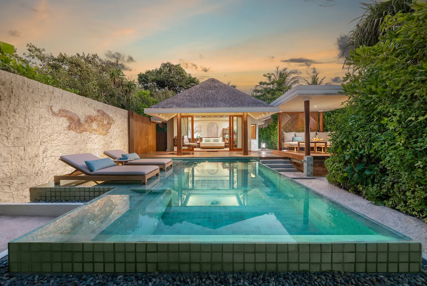 anantara kihavah maldives villas sunset beach pool villa dusk view ambience