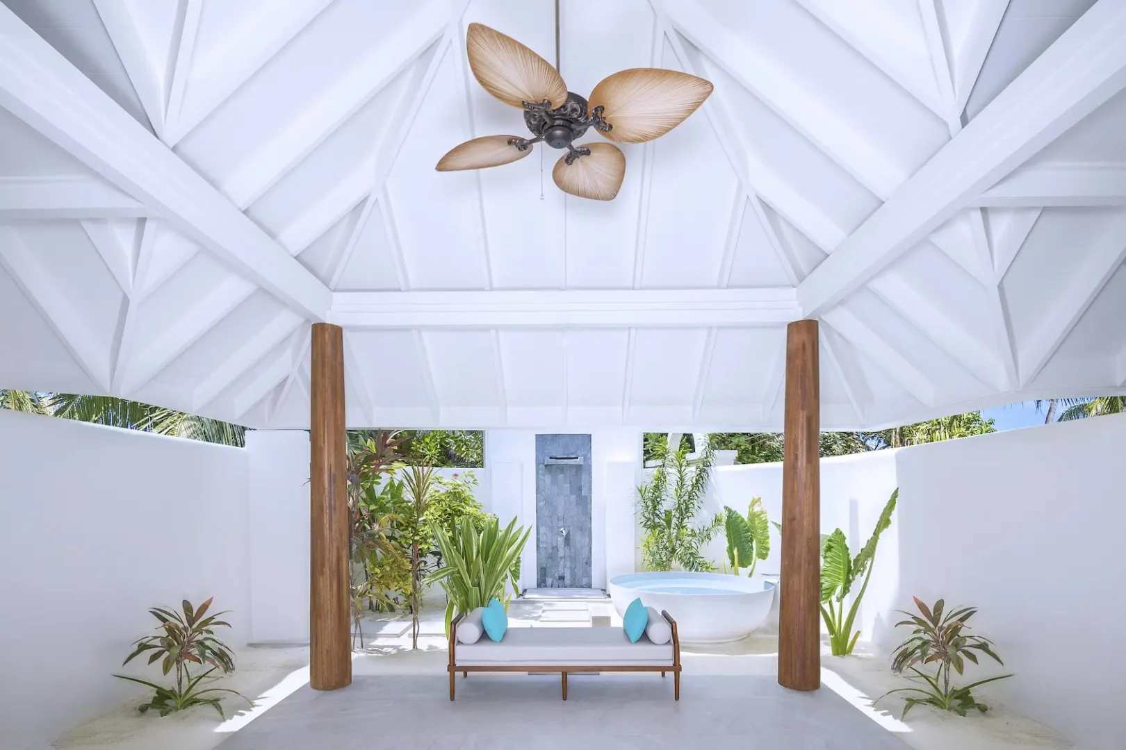 elegant twin bathroom in the two bedroom family beach pool villa at anantara kihavah maldives villas featuring serene daylight and refined coastal styling
