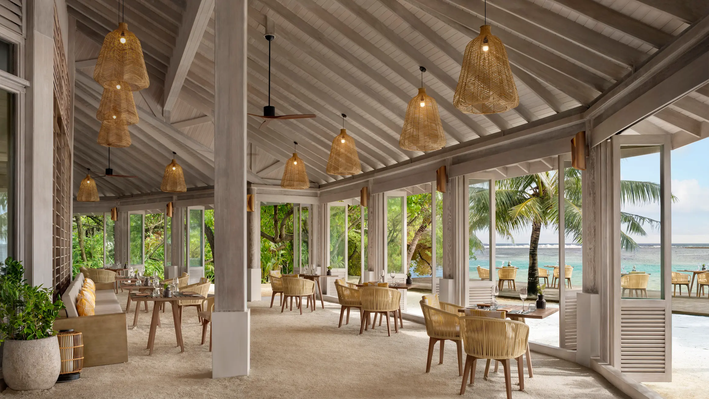 interior design of cumin restaurant at anantara veli maldives resort showcasing warm island textures and refined dining ambience