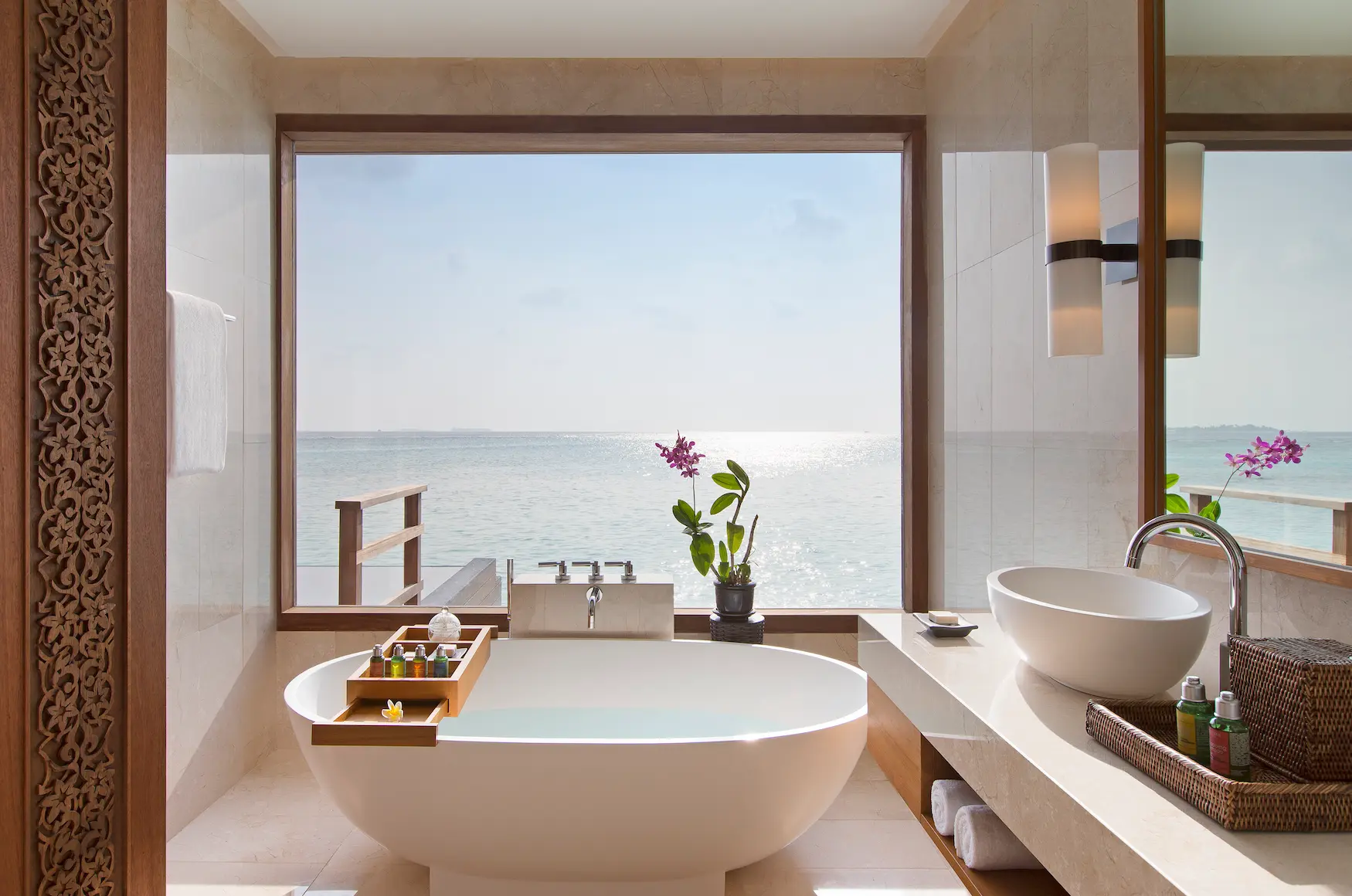 deluxe overwater pool bungalow bathroom at anantara veli maldives resort featuring serene lagoon views and refined island design