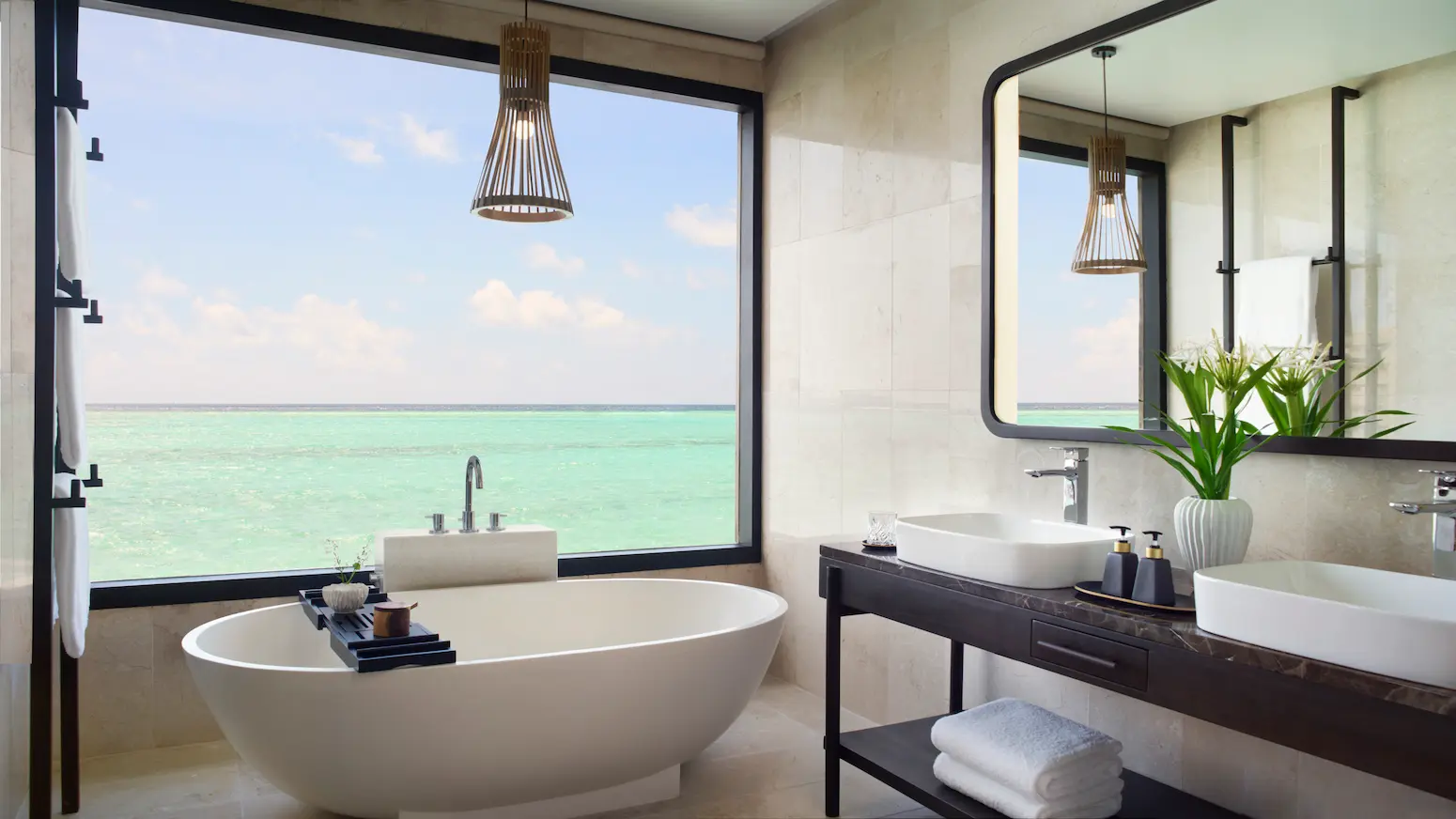 overwater pool villa bathroom at anantara veli maldives resort featuring serene lagoon views and refined island design