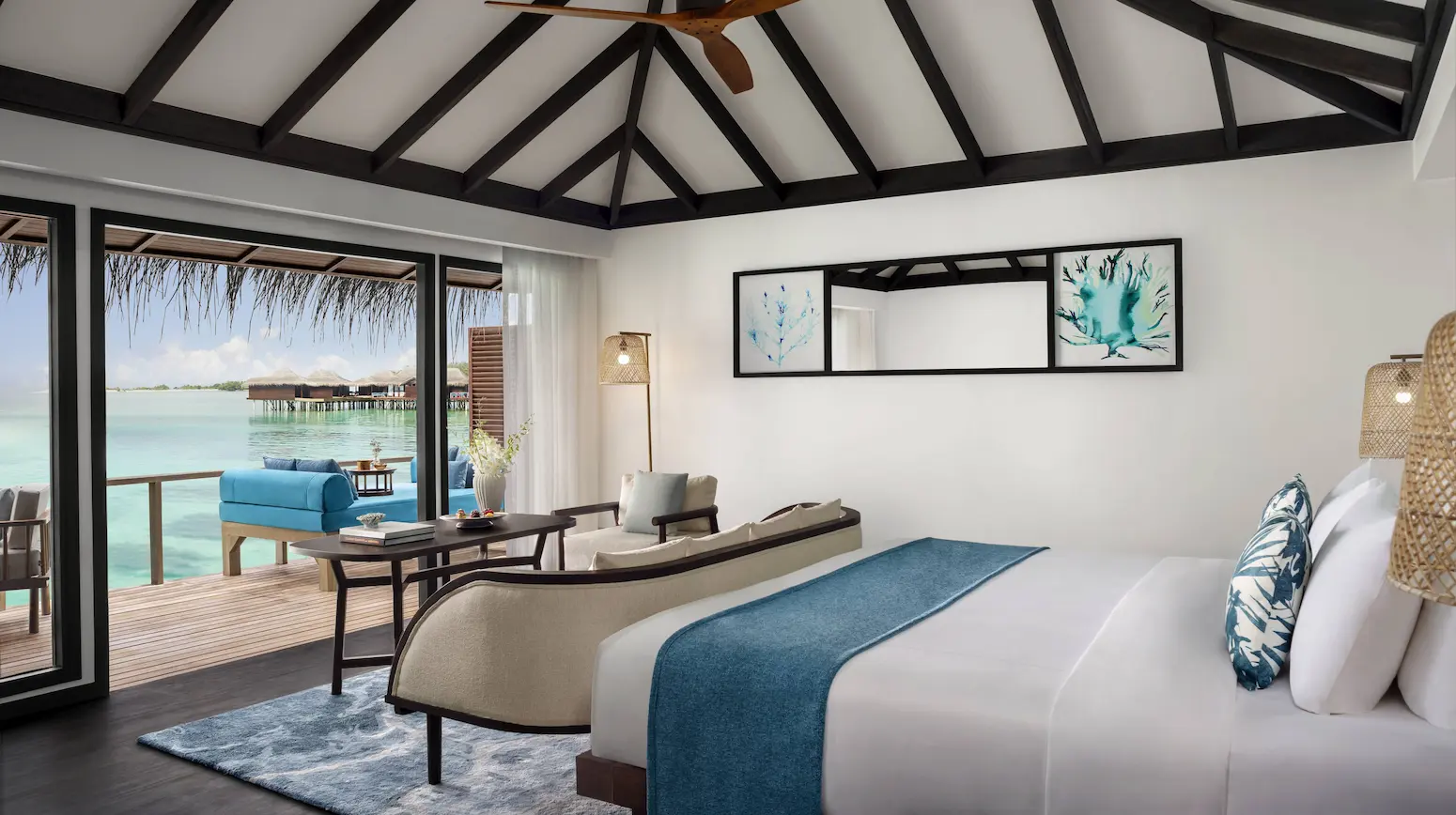overwater villa bedroom views at anantara veli maldives resort showcasing serene lagoon scenery and tranquil island ambience