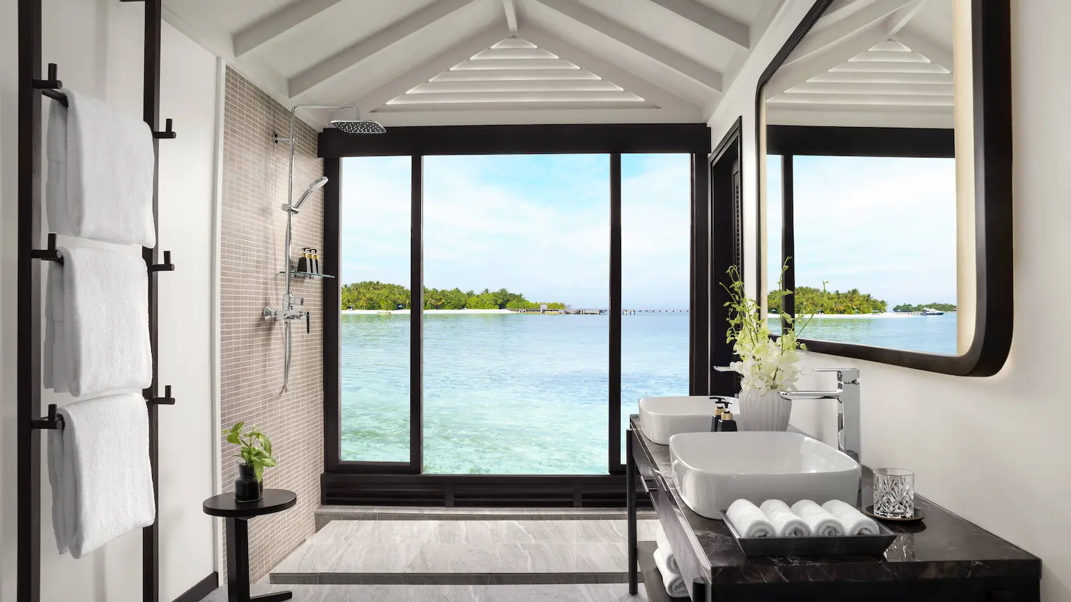 elegant superior overwater villa bathroom at anantara veli maldives resort featuring serene lagoon views and refined island design