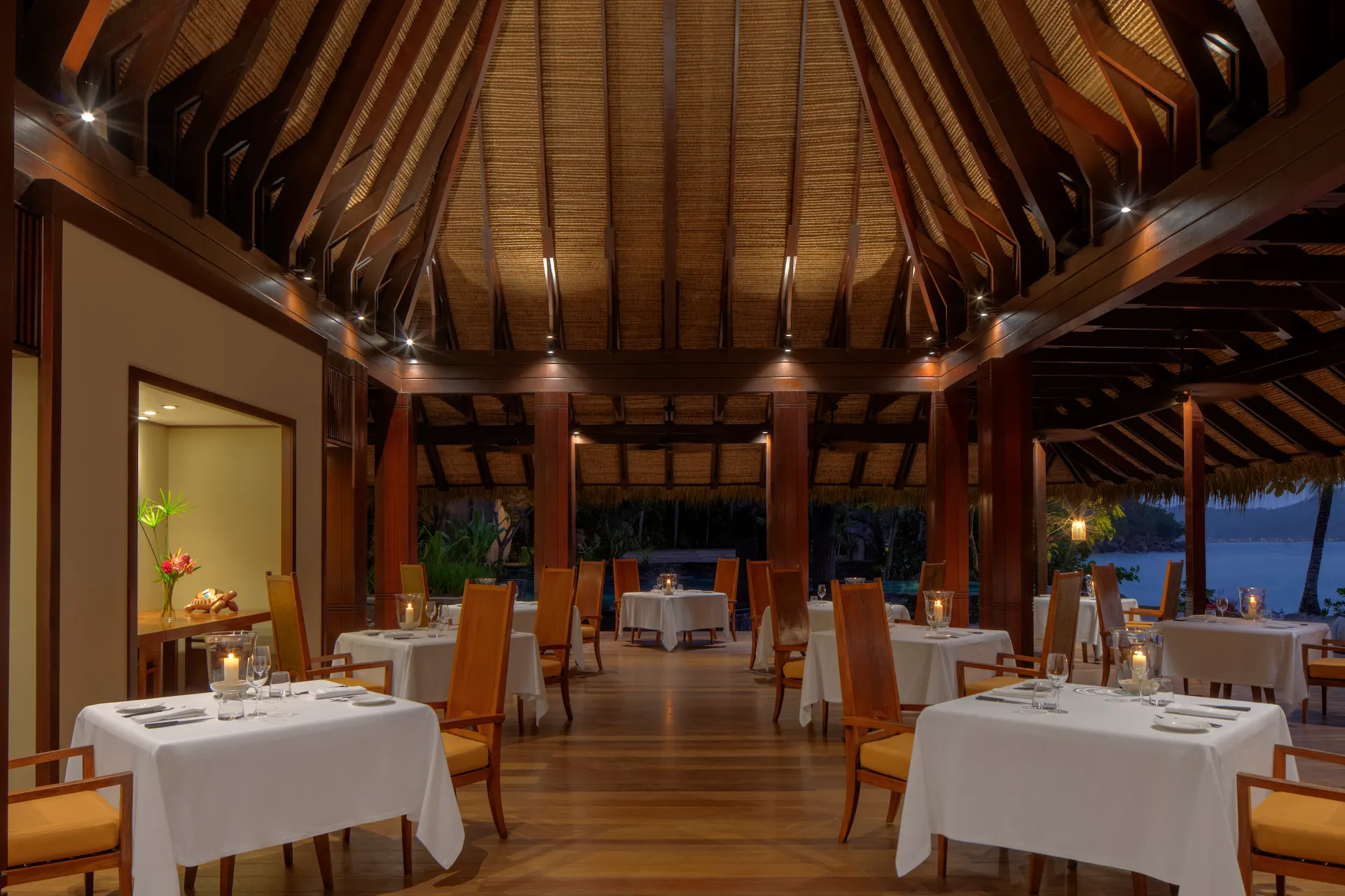 wine cellar at Anantara Maia Seychelles Villas with curated wine selection in a cool, dimly lit storage space