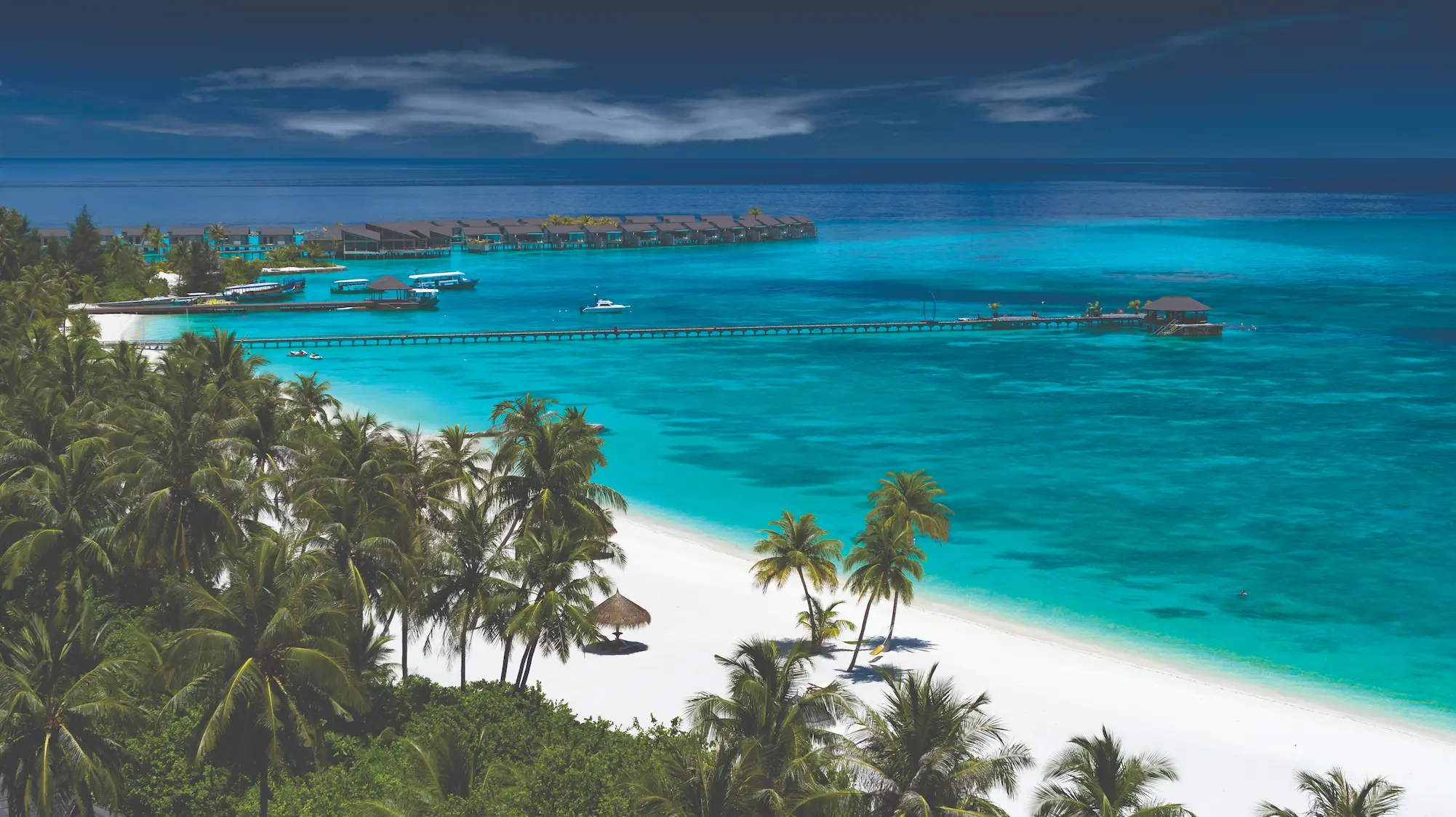 aerial view of the peaceful shoreline at atmosphere kanifushi