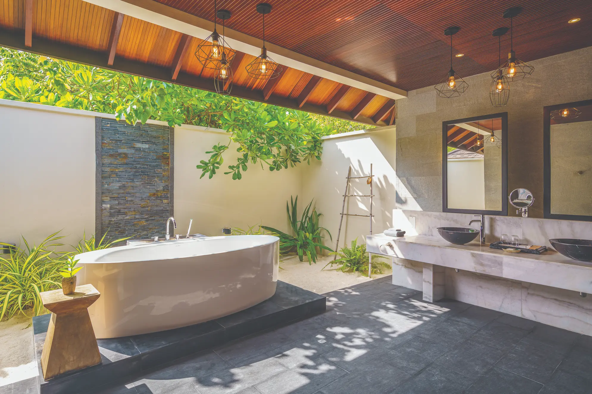 spacious kanifushi grand villa bathroom with serene resort ambiance atmosphere kanifushi maldives