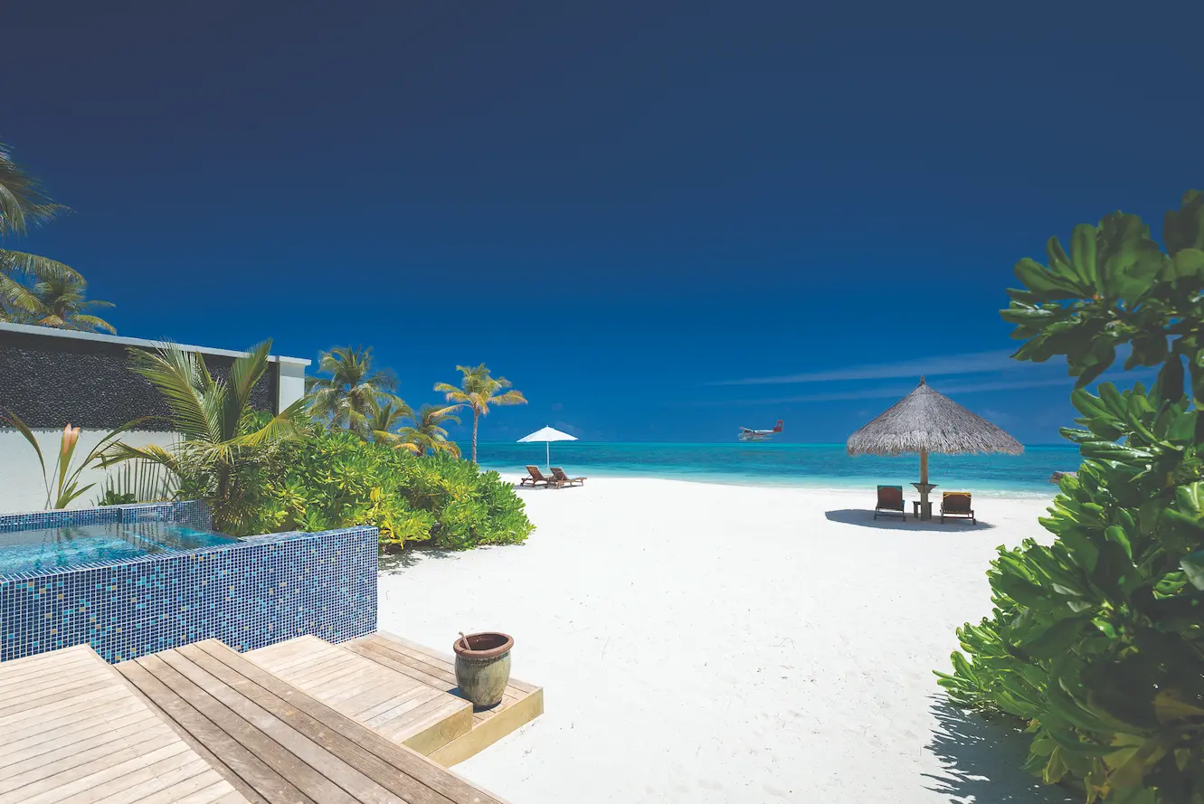 grand pool villa with serene beach view atmosphere kanifushi maldives