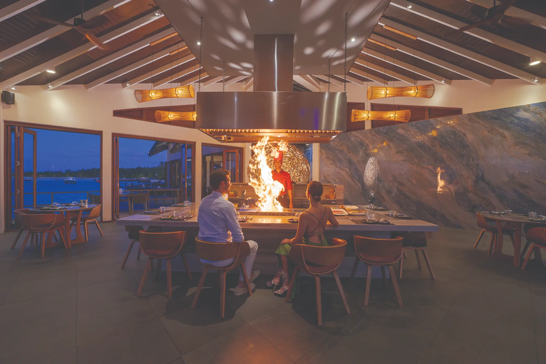 lifestyle moment at the pier six teppanyaki grill atmosphere kanifushi maldives