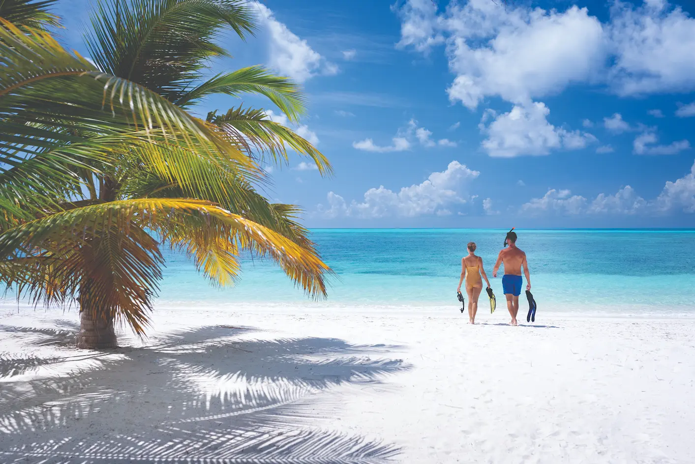 atmosphere kanifushi maldives snorkeling couple enjoying a relaxed lifestyle experience