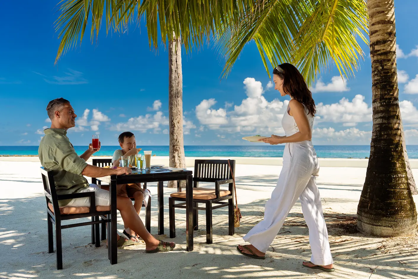 atmosphere kanifushi maldives spice main restaurant outdoor dining lifestyle scene