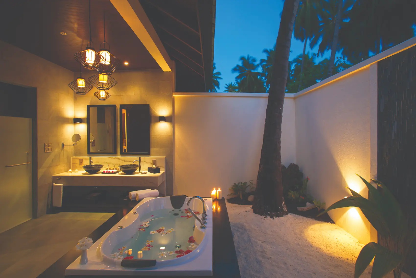 elegant sunset beach villa bathroom setting atmosphere kanifushi maldives