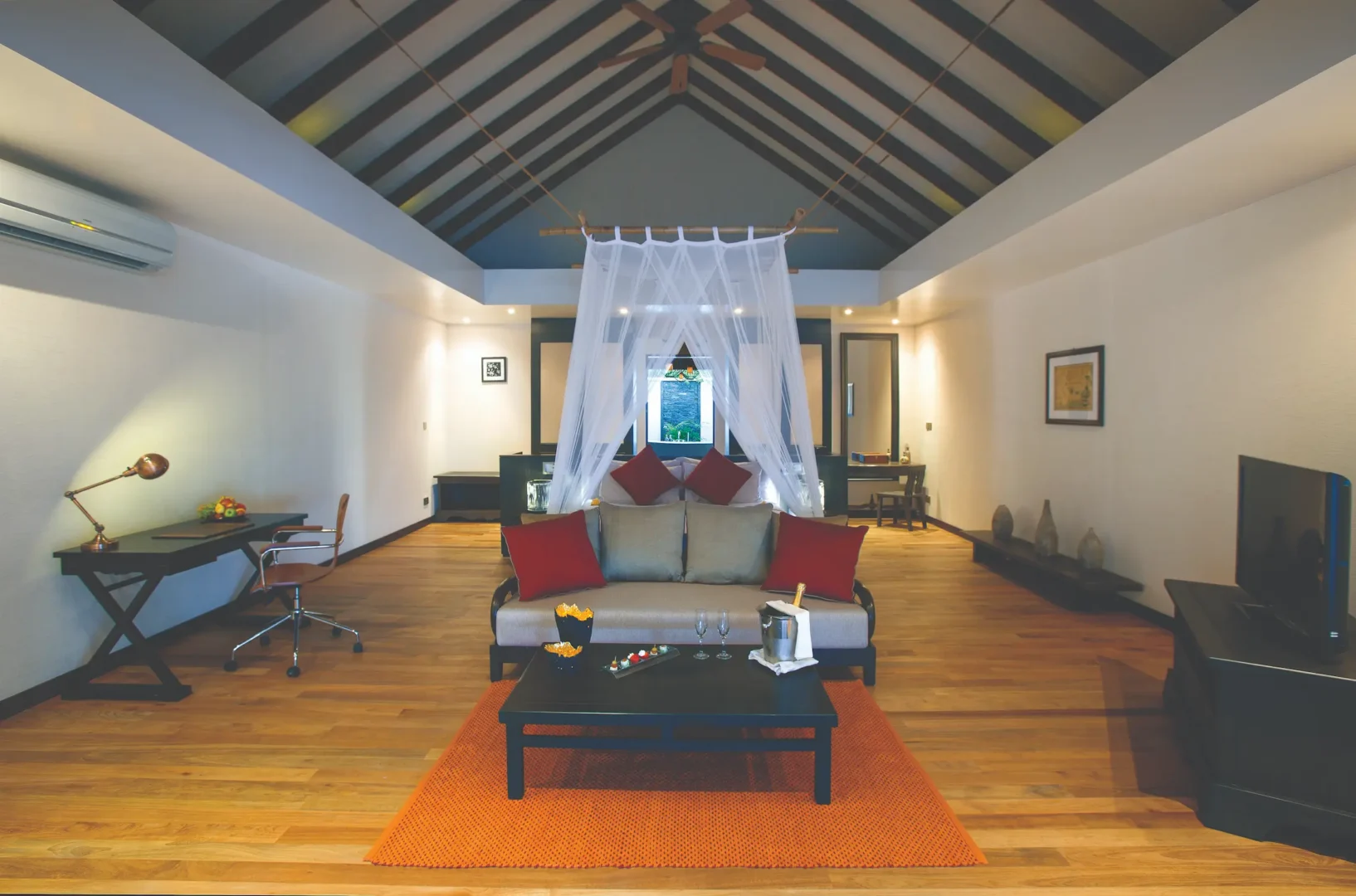 calm sunset beach villa interior ambiance atmosphere kanifushi maldives