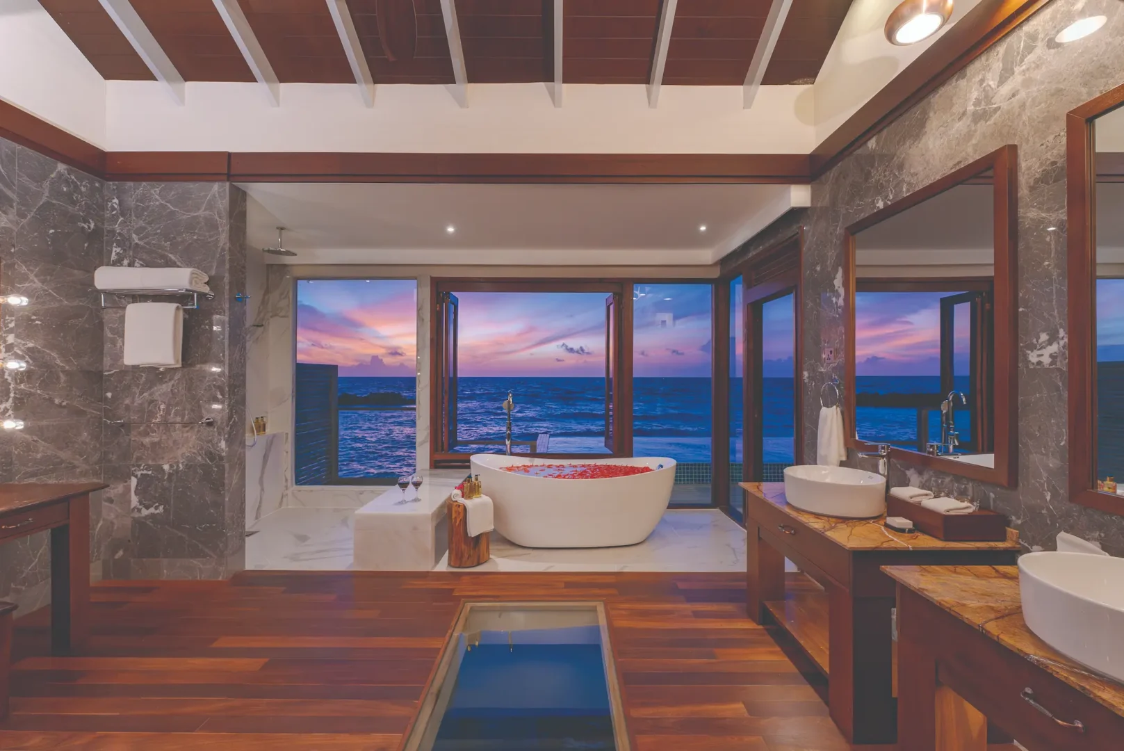 elegant bathroom inside sunset water villa with private pool atmosphere kanifushi maldives
