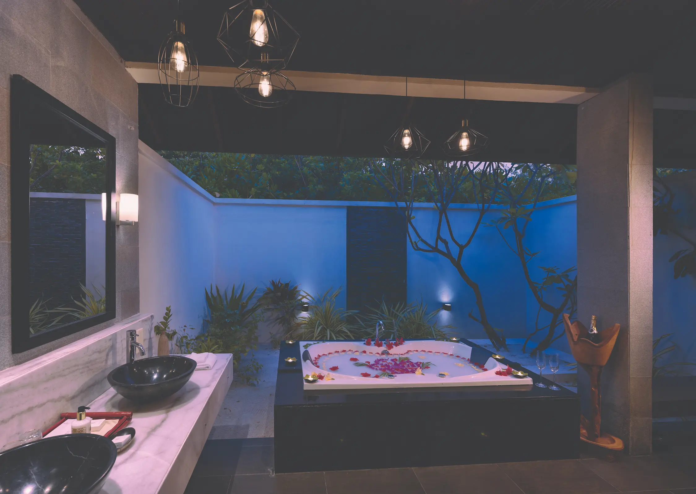 spacious bathroom inside two bedroom sunset family beach villa with soft day to evening ambience atmosphere kanifushi maldives