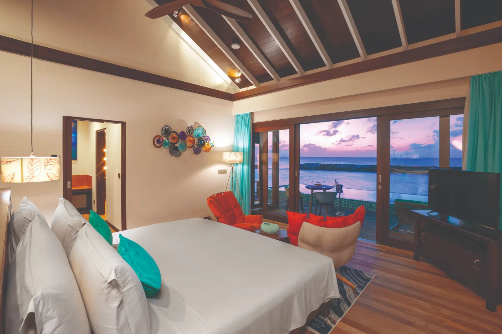 peaceful water villa with private pool and sunset view atmosphere kanifushi maldives