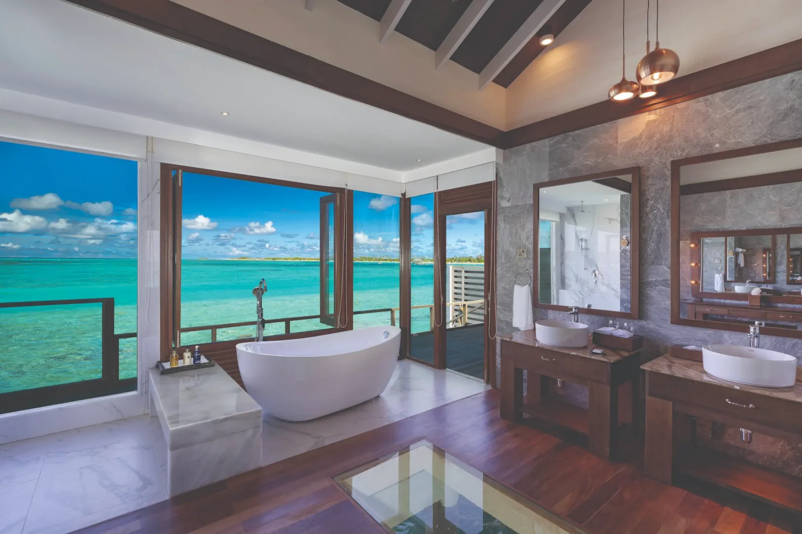 luxurious water villa bathroom with serene ocean view atmosphere kanifushi