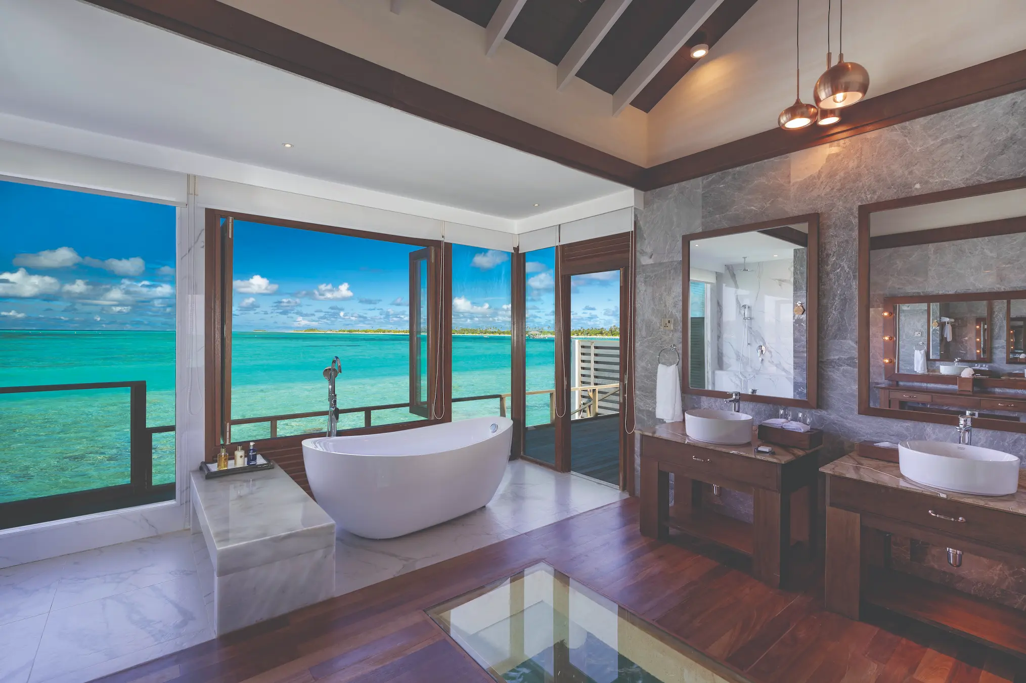 luxurious water villa bathroom with serene ocean view atmosphere kanifushi