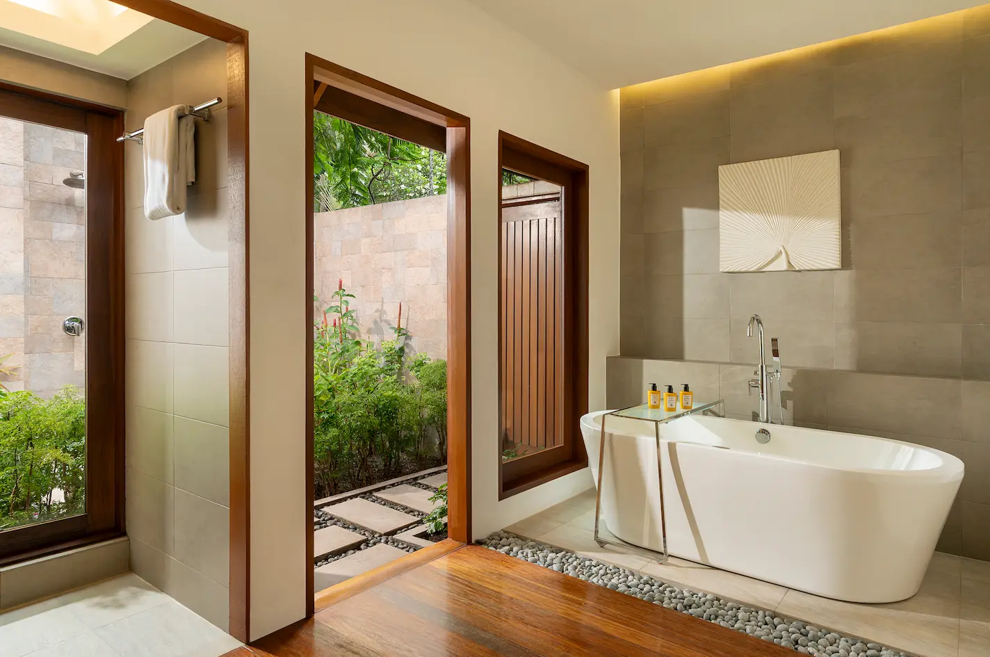 bathroom of the baros pool villa at baros maldives with elegant island styling and soft natural light