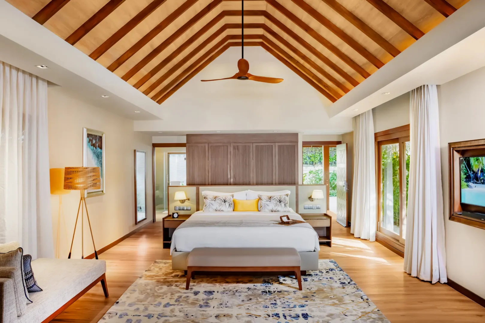 baros suite at baros maldives featuring contemporary island design with elegant natural textures
