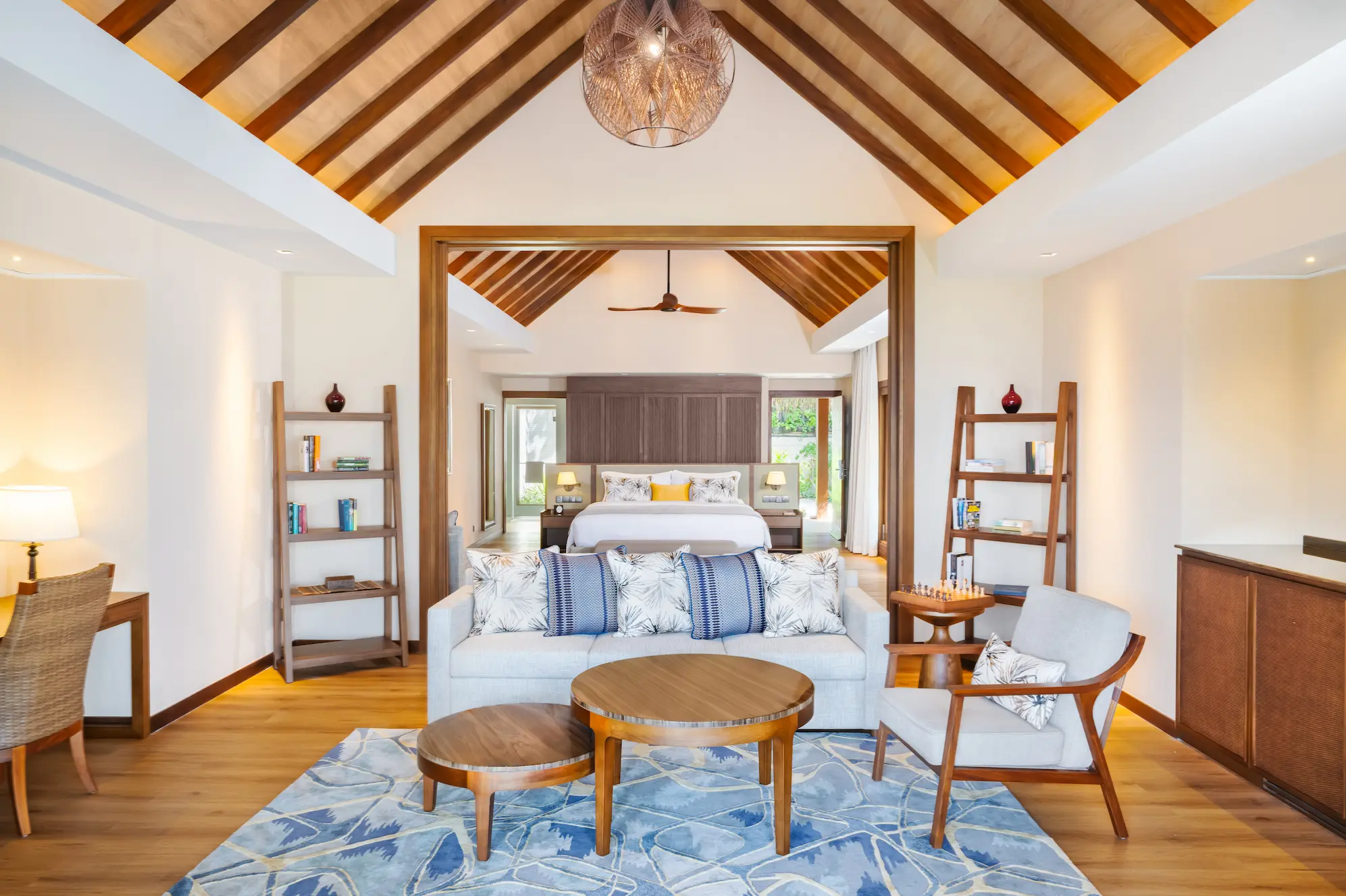 interior of the baros suite at baros maldives featuring contemporary island design and warm natural textures