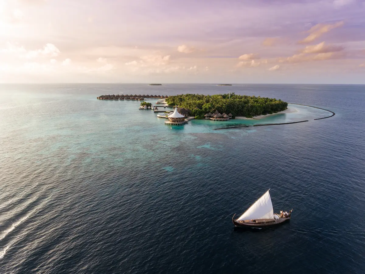 nooma dining at baros maldives offering a private traditional dhoni experience on the calm lagoon