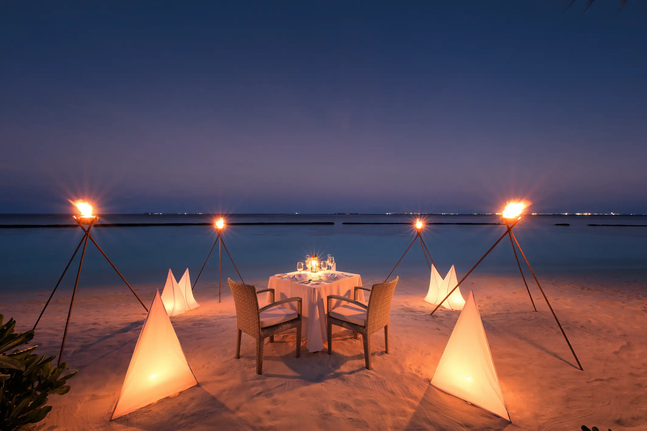 sandbank dining at baros maldives set on a secluded stretch of white sand surrounded by clear lagoon waters