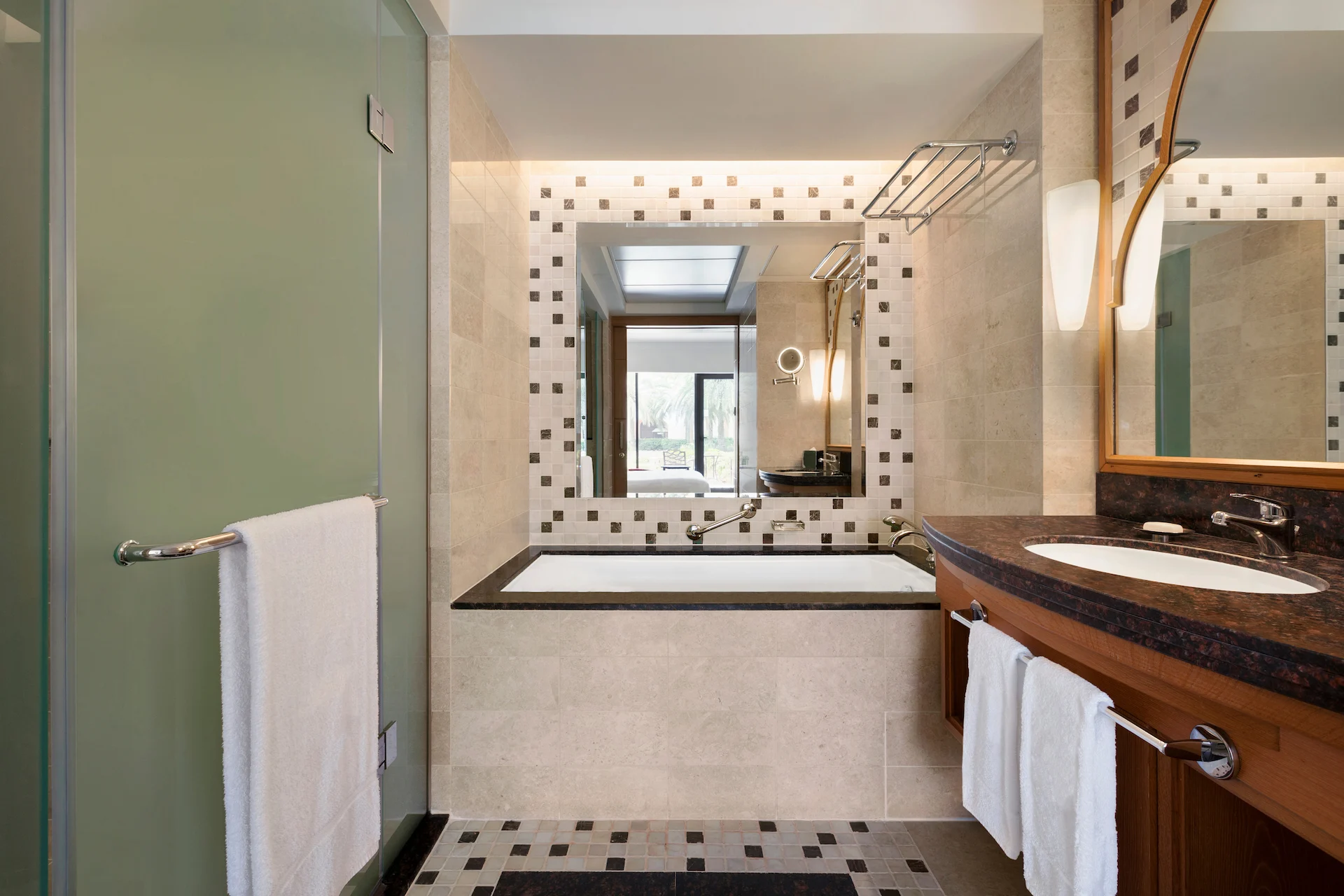 interior of bathroom in guest room with terrace at hilton muscat al bandar oman resort