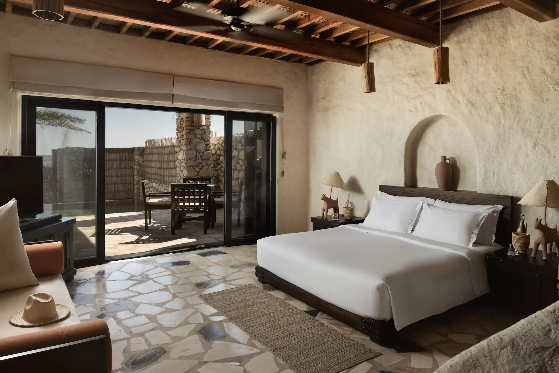 bedroom in duplex two bedroom pool villa suite at six senses zighy bay oman